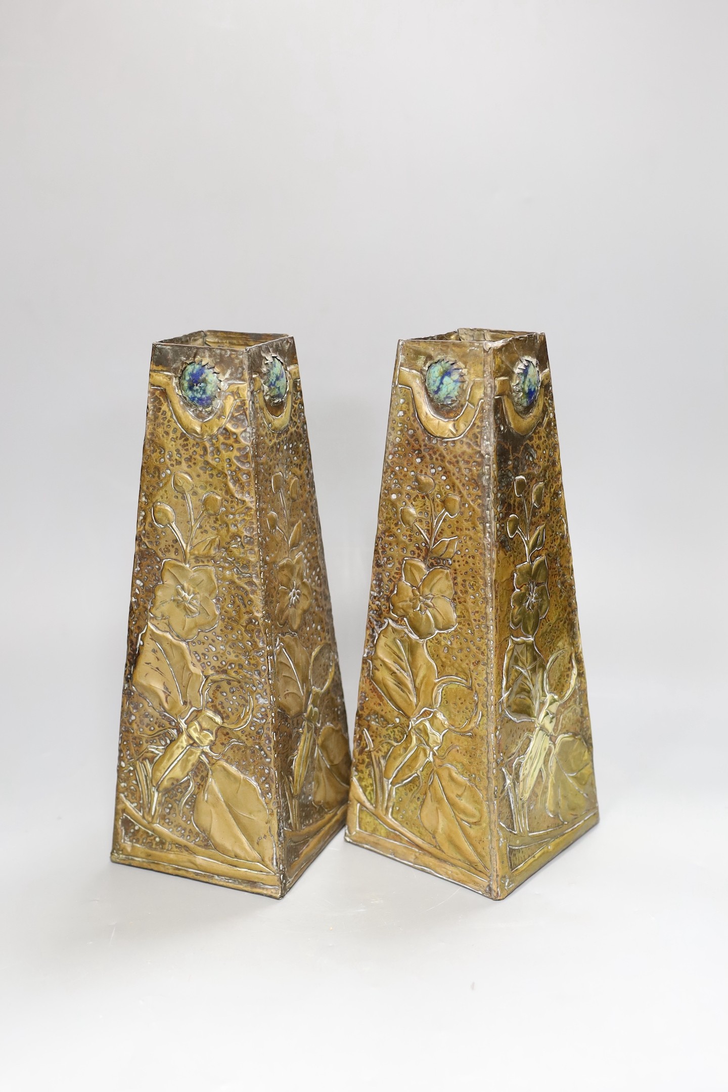 A pair of Arts & Crafts copper and brass vases, 30cms